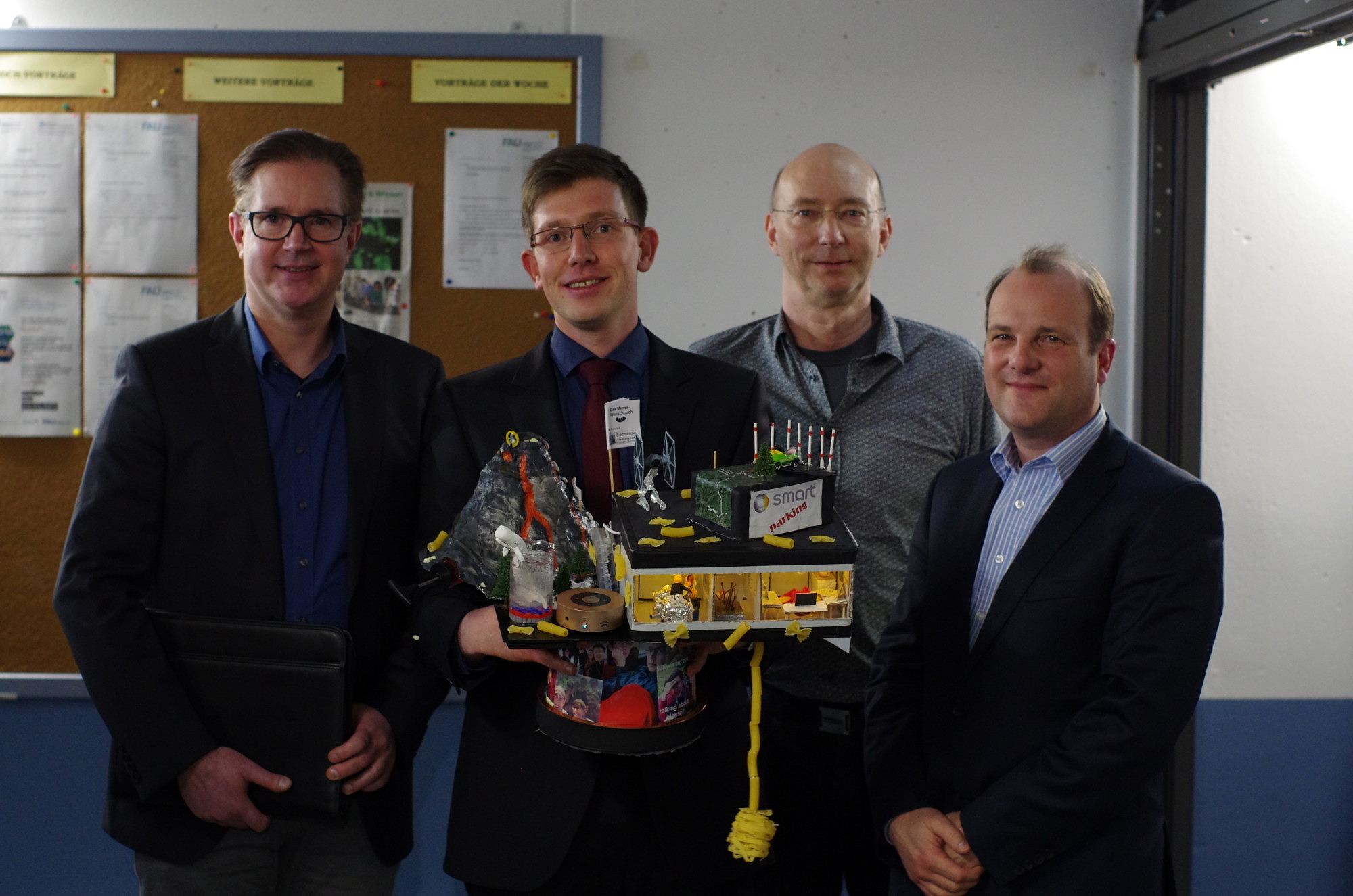 Dr. Matthias Schwarz 2019 and examiners Prof. Libuda, Prof. Görling, Prof. Schneider (image: FAU)